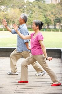 How Can I Strengthen My Joints Naturally | Senior Chinese Couple Doing Tai Chi In Park