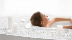 How Can I Strengthen My Joints Naturally | Total relaxation. Woman enjoying hot bath with candles