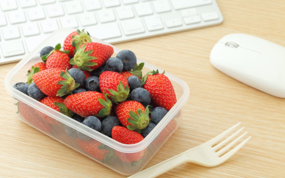 Berry mix lunch box in working desk